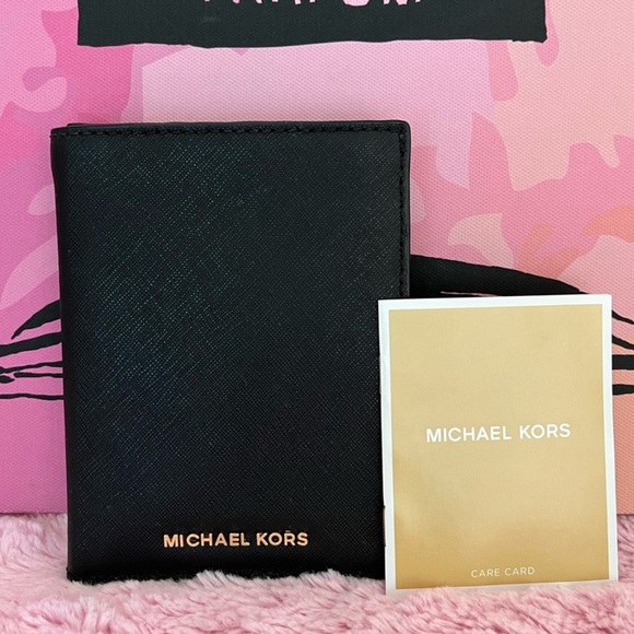 Michael Kors Handbags - EUC Michael Kors Jet Set Travel Passport Case Leather Signature Wallet Black